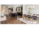 Open-concept living space with modern kitchen, dining area, and stylish decor at 1329 Booth Ave, Atlanta, GA 30318