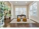 Bright home office with large windows, a desk, and stylish decor creating a productive workspace at 1329 Booth Ave, Atlanta, GA 30318