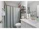 Bathroom featuring a shower with curtain, a vanity with sink, and decor at 1344 Chipmunk Forest Chase, Powder Springs, GA 30127