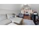Open bonus room area with a living space, bedroom setup, and games at 1344 Chipmunk Forest Chase, Powder Springs, GA 30127