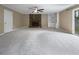 Spacious living room with fireplace, built-in shelving, and sliding glass doors at 1899 Stratford Arms Dr, Morrow, GA 30260