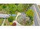 Aerial view of a home with mature trees, and landscaping, situated near a major roadway at 281 Piedmont Ne Rd, Marietta, GA 30066