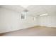 Spacious basement area featuring multiple closets and neutral carpeting, great for storage or recreation at 281 Piedmont Ne Rd, Marietta, GA 30066