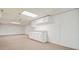 Finished basement featuring storage cabinets and a large open area, perfect for customization at 281 Piedmont Ne Rd, Marietta, GA 30066