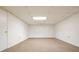 Unfinished basement area with clean walls and carpeting, offering potential for customization at 281 Piedmont Ne Rd, Marietta, GA 30066