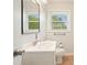 Bright bathroom featuring a large vanity with a modern faucet at 281 Piedmont Ne Rd, Marietta, GA 30066