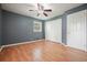 This bedroom offers hardwood floors, a ceiling fan and a closet for optimal storage at 281 Piedmont Ne Rd, Marietta, GA 30066