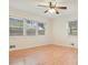 An empty bedroom showcases hardwood floors and windows that provide plenty of natural light at 281 Piedmont Ne Rd, Marietta, GA 30066