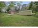 Brick two-story home features a large lot, and is surrounded by mature trees and landscaping at 281 Piedmont Ne Rd, Marietta, GA 30066