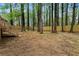 Picturesque backyard with newly constructed privacy fence, stairs to the deck, and lush greenery at 3805 Cloudland Se Dr, Smyrna, GA 30082