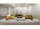 Finished basement with modern furniture, neutral decor, and stylish accent wall at 3805 Cloudland Se Dr, Smyrna, GA 30082