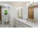 Stylish bathroom featuring double vanities, gold fixtures, and contemporary design at 3805 Cloudland Se Dr, Smyrna, GA 30082