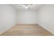 Bright bedroom with hardwood floors, a ceiling fan, and board and batten accent wall at 3805 Cloudland Se Dr, Smyrna, GA 30082