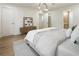 Spacious bedroom featuring hardwood floors, modern decor, and plenty of natural light at 3805 Cloudland Se Dr, Smyrna, GA 30082
