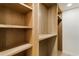 This closet has light wooden shelving and fixtures at 3805 Cloudland Se Dr, Smyrna, GA 30082
