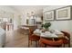 Charming dining area with seating for six and an open view to the kitchen at 3805 Cloudland Se Dr, Smyrna, GA 30082