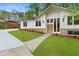 Front Entrance of a renovated home with hardwood front door at 3805 Cloudland Se Dr, Smyrna, GA 30082