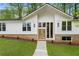 Bright front door and walkway up to this beautiful renovated house at 3805 Cloudland Se Dr, Smyrna, GA 30082