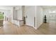 View of a hallway, bench with storage, and coat hooks near the front door at 3805 Cloudland Se Dr, Smyrna, GA 30082