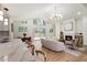 Spacious living room with a fireplace, an open floor plan, and lots of natural light at 3805 Cloudland Se Dr, Smyrna, GA 30082