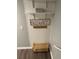 Functional entryway with shelving, wall hooks, and a shoe bench at 771 Jordan Ln # K, Decatur, GA 30033