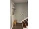 Functional entryway with shelving, wall hooks, and a shoe bench at 771 Jordan Ln # K, Decatur, GA 30033