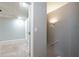 A home hallway leads to the staircase and other rooms at 771 Jordan Ln # K, Decatur, GA 30033