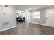Spacious living room with wood-look flooring, natural light, and an open floorplan at 771 Jordan Ln # K, Decatur, GA 30033