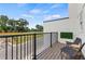 Outdoor balcony featuring comfortable seating, black metal railings, and neighborhood views at 2531 Astaire Ct, Atlanta, GA 30318