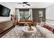 Bright and airy living room featuring modern decor, comfortable seating, and ample natural light at 2531 Astaire Ct, Atlanta, GA 30318