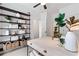 Chic home office featuring a modern desk, open shelving, and contemporary decorative accents at 2531 Astaire Ct, Atlanta, GA 30318