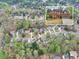 A landscaped home sits on a large lot with mature trees, close to community amenities at 2739 Springfount Trl, Lawrenceville, GA 30043