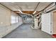 Unfinished basement with exposed ceiling, large flooring and utility systems at 2739 Springfount Trl, Lawrenceville, GA 30043