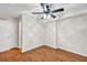 Bright bedroom features a ceiling fan, hardwood floors, and a neutral color palette at 2739 Springfount Trl, Lawrenceville, GA 30043