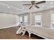 Large bonus room featuring a ceiling fan, recessed lights, and windows for natural light at 2739 Springfount Trl, Lawrenceville, GA 30043