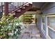 Cozy covered patio with stone flooring, a potting table, and flower boxes, perfect for gardening enthusiasts at 2739 Springfount Trl, Lawrenceville, GA 30043