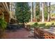Charming backyard patio with brick accents and garden seating at 3095 Meadow Lark Ln, Atlanta, GA 30344