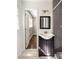 Cozy bathroom featuring gray tiled shower and modern vanity at 3095 Meadow Lark Ln, Atlanta, GA 30344