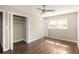 Bedroom with hardwood floors, closet and bright windows at 3095 Meadow Lark Ln, Atlanta, GA 30344