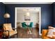 Dining room with view to the living room, modern furniture, and stylish decor at 3095 Meadow Lark Ln, Atlanta, GA 30344