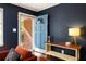 Inviting entryway with a blue door and view of the brick exterior at 3095 Meadow Lark Ln, Atlanta, GA 30344