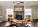 Relaxing living room with stone fireplace and comfortable seating at 3095 Meadow Lark Ln, Atlanta, GA 30344