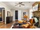 Stylish living room boasts hardwood floors, modern furniture, and a stone fireplace, perfect for relaxing and entertaining at 3095 Meadow Lark Ln, Atlanta, GA 30344