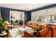 Bright living room with large windows and a view of the surrounding trees at 3095 Meadow Lark Ln, Atlanta, GA 30344