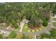Charming home nestled among lush greenery, showcasing a well-manicured lawn and inviting curb appeal at 328 Allatoona Shores Dr, Canton, GA 30114