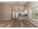 Open-concept kitchen featuring an island with stone accents and stainless steel appliances at 328 Allatoona Shores Dr, Canton, GA 30114