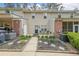 Backyard patio with seating area, landscaping, and brick accents at 3729 Town Square Nw Cir # 6, Kennesaw, GA 30144