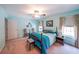 Bright primary bedroom with a ceiling fan, carpet, and natural light at 3729 Town Square Nw Cir # 6, Kennesaw, GA 30144