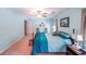 Light-filled primary bedroom with a ceiling fan and neutral carpet at 3729 Town Square Nw Cir # 6, Kennesaw, GA 30144