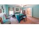 Spacious primary bedroom with carpet flooring, ceiling fan, and adjacent bathroom at 3729 Town Square Nw Cir # 6, Kennesaw, GA 30144
